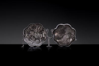 Lot 13 - A MINIATURE PARCEL-GILT SILVER ‘WINGED DEER’ BOX AND COVER, TANG DYNASTY