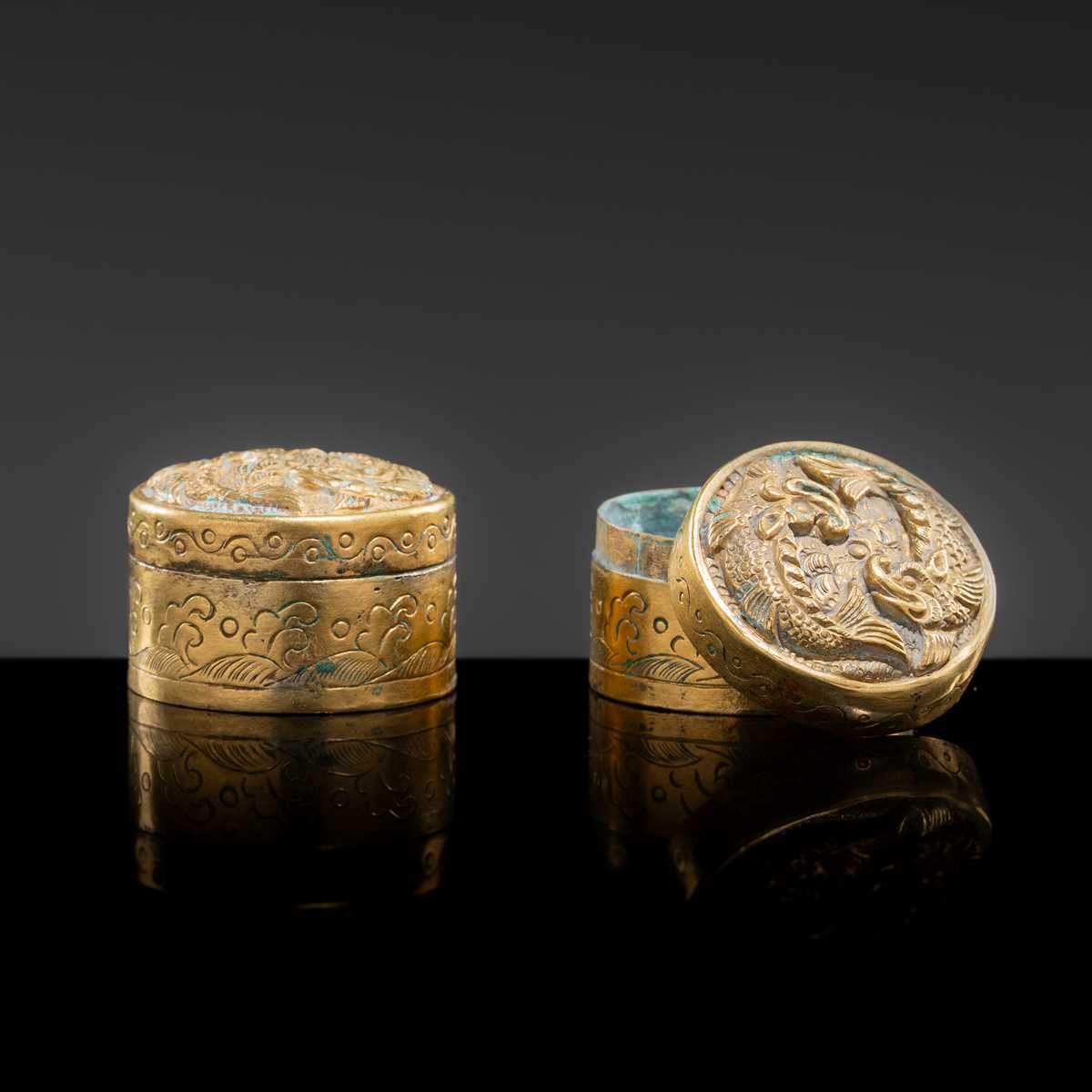 Lot 16 - A PAIR OF MINIATURE GILT COPPER BOXES AND COVERS, LIAO DYNASTY