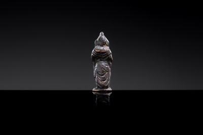 Lot 15 - A SMALL BRONZE FIGURE OF AN ADORANT, LATE TANG TO SONG DYNASTY