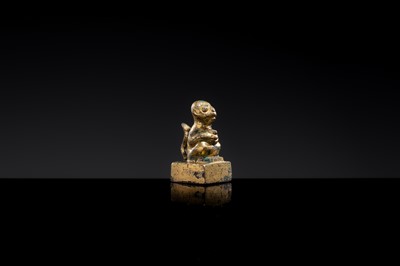 Lot 10 - A GILT BRONZE ‘MONKEY AND PEACH’ SEAL, NORTHERN WEI DYNASTY