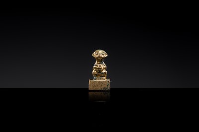 Lot 10 - A GILT BRONZE ‘MONKEY AND PEACH’ SEAL, NORTHERN WEI DYNASTY