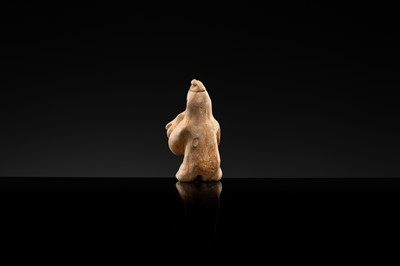 Lot 32 - AN EARTHENWARE FIGURE OF A XIANBEI WOMAN HOLDING A LAMB, LATE EASTERN HAN TO SIX DYNASTIES PERIOD