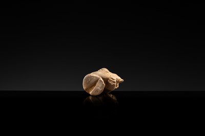 Lot 32 - AN EARTHENWARE FIGURE OF A XIANBEI WOMAN HOLDING A LAMB, LATE EASTERN HAN TO SIX DYNASTIES PERIOD