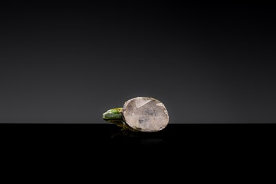 A SANCAI-GLAZED POTTERY FIGURE OF A CAMEL RIDER, TANG DYNASTY