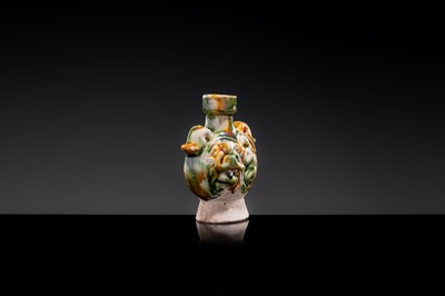 A MINIATURE SANCAI-GLAZED PILGRIM’S FLASK WITH MUSICIANS AND DUCKS, TANG DYNASTY