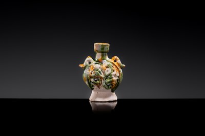 A MINIATURE SANCAI-GLAZED PILGRIM’S FLASK WITH MUSICIANS AND DUCKS, TANG DYNASTY