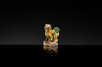 Lot 44 - A SANCAI-GLAZED POTTERY FIGURE OF A LION, TANG DYNASTY