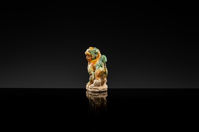 Lot 44 - A SANCAI-GLAZED POTTERY FIGURE OF A LION, TANG DYNASTY