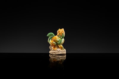 Lot 44 - A SANCAI-GLAZED POTTERY FIGURE OF A LION, TANG DYNASTY