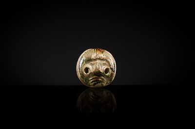 Lot 50 - A SANCAI GLAZED POTTERY WHISTLE IN THE FORM OF A FOREIGNER HEAD, TANG DYNASTY