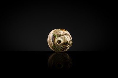 Lot 50 - A SANCAI GLAZED POTTERY WHISTLE IN THE FORM OF A FOREIGNER HEAD, TANG DYNASTY