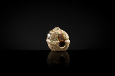 Lot 50 - A SANCAI GLAZED POTTERY WHISTLE IN THE FORM OF A FOREIGNER HEAD, TANG DYNASTY