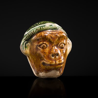 Lot 46 - A ‘MONKEY’S HEAD’ SANCAI GLAZED EARTHENWARE FIGURE, TANG DYNASTY