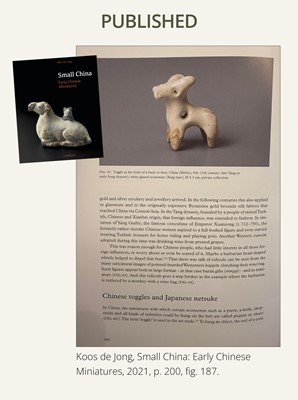 Lot 62 - A WHITE GLAZED XINGYAO POTTERY TOGGLE IN THE FORM OF A DEER, SONG DYNASTY