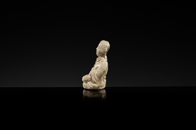 A RARE DINGYAO STONEWARE FIGURE OF A BOY DRUMMER, SONG DYNASTY