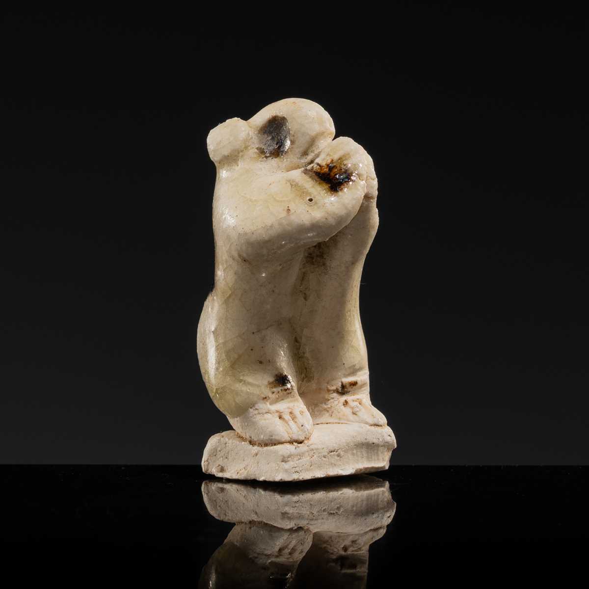 Lot 61 - A CHARMING DINGYAO STONEWARE FIGURE OF A MONGOOSE, EARLY SONG DYNASTY