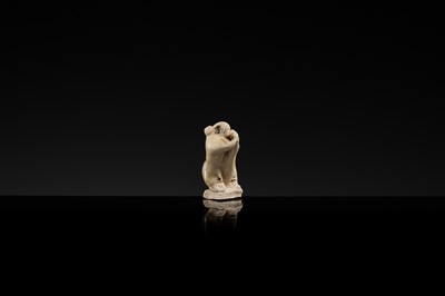 Lot 61 - A CHARMING DINGYAO STONEWARE FIGURE OF A MONGOOSE, EARLY SONG DYNASTY