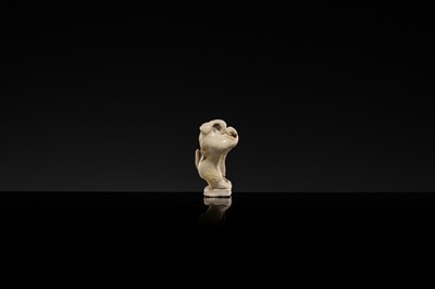 Lot 61 - A CHARMING DINGYAO STONEWARE FIGURE OF A MONGOOSE, EARLY SONG DYNASTY