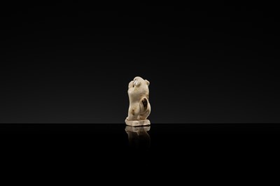 Lot 61 - A CHARMING DINGYAO STONEWARE FIGURE OF A MONGOOSE, EARLY SONG DYNASTY