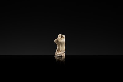 Lot 61 - A CHARMING DINGYAO STONEWARE FIGURE OF A MONGOOSE, EARLY SONG DYNASTY