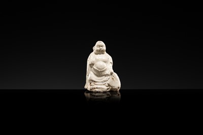 A DINGYAO STONEWARE FIGURE OF BUDAI, LIAO DYNASTY