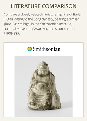 A DINGYAO STONEWARE FIGURE OF BUDAI, LIAO DYNASTY