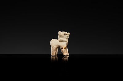 Lot 63 - A SMALL WHITE GLAZED DINGYAO FIGURE OF A DOG, SONG DYNASTY
