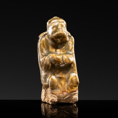 Lot 91 - A YAOZHOU STONEWARE CELADON FIGURE OF A SCHOLAR, NORTHERN SONG DYNASTY