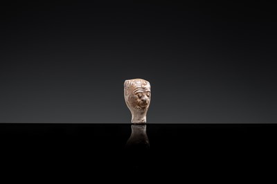 Lot 51 - A GLAZED POTTERY WHISTLE IN THE FORM OF THE HEAD OF A FOREIGNER, LATE TANG DYNASTY