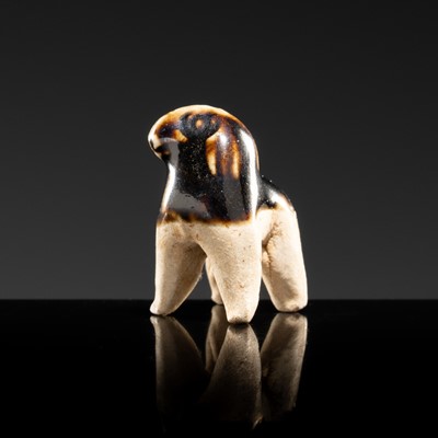 Lot 67 - A DARK BROWN GLAZED POTTERY FIGURE OF A SHEEP, NORTHERN SONG DYNASTY