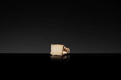 A GLAZED POTTERY FIGURE OF A TODDLER, NORTHERN SONG DYNASTY