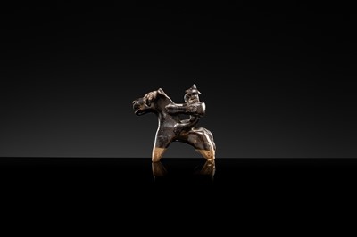 Lot 60 - A DARK BROWN GLAZED POTTERY EQUESTRIAN FIGURE, LIAO OR NORTHERN SONG DYNASTY