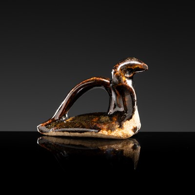 Lot 96 - A DARK BROWN GLAZED STONEWARE FIGURE OF A WATER BIRD, SONG TO YUAN DYNASTY