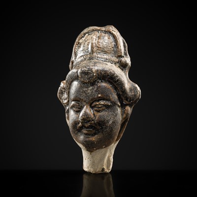 Lot 94 - A DARK BROWN GLAZED STONEWARE WHISTLE IN THE FORM OF A BODHISATTVA HEAD, SONG DYNASTY