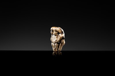 A BROWN GLAZED STONEWARE WHISTLE IN THE FORM OF A PAIR OF MONKEYS, SONG TO JIN DYNASTY