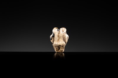 A BROWN GLAZED STONEWARE WHISTLE IN THE FORM OF A PAIR OF MONKEYS, SONG TO JIN DYNASTY