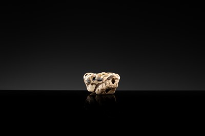 A BROWN GLAZED STONEWARE WHISTLE IN THE FORM OF A PAIR OF MONKEYS, SONG TO JIN DYNASTY