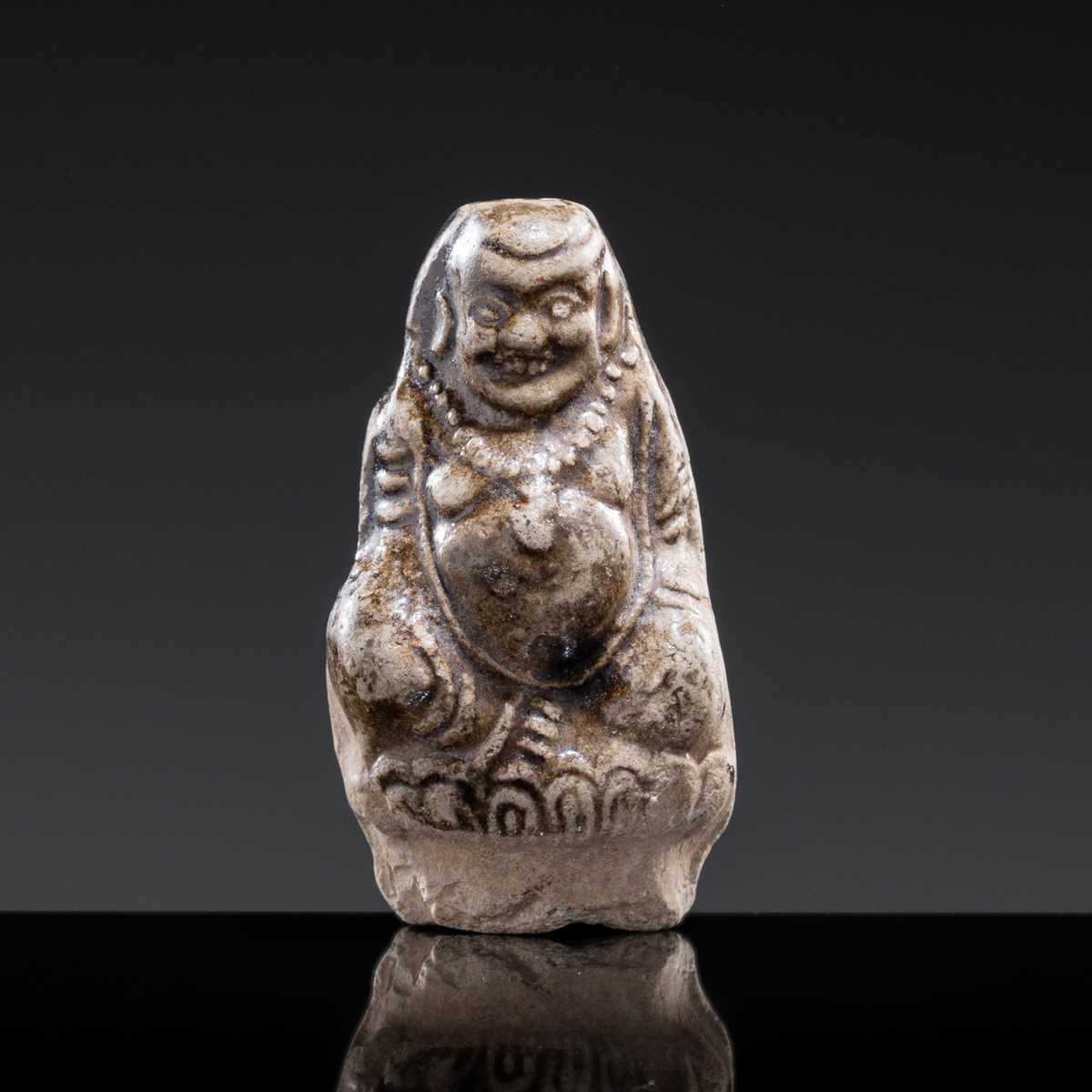A ‘PROTECTIVE GOD’ GLAZED POTTERY WHISTLE, NORTHERN SONG TO JIN DYNASTY