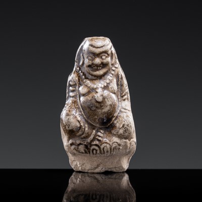 A ‘PROTECTIVE GOD’ GLAZED POTTERY WHISTLE, NORTHERN SONG TO JIN DYNASTY