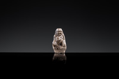 A ‘PROTECTIVE GOD’ GLAZED POTTERY WHISTLE, NORTHERN SONG TO JIN DYNASTY