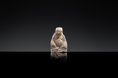 A BROWN-GLAZED POTTERY WHISTLE IN THE FORM OF A PROTECTIVE GOD, JIN DYNASTY