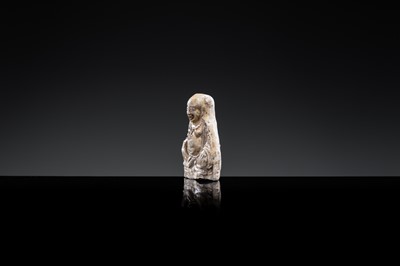 A BROWN-GLAZED POTTERY WHISTLE IN THE FORM OF A PROTECTIVE GOD, JIN DYNASTY