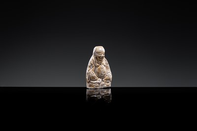 A BROWN-GLAZED POTTERY WHISTLE IN THE FORM OF A PROTECTIVE GOD, JIN DYNASTY
