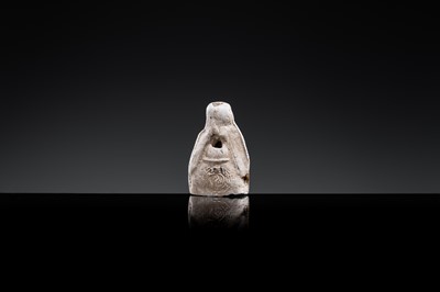 A BROWN-GLAZED POTTERY WHISTLE IN THE FORM OF A PROTECTIVE GOD, JIN DYNASTY