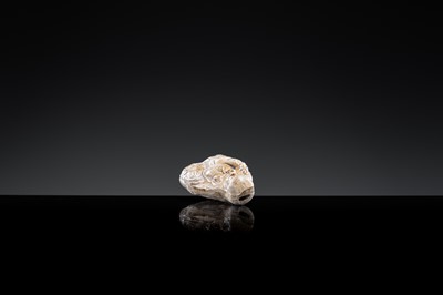 A BROWN-GLAZED POTTERY WHISTLE IN THE FORM OF A PROTECTIVE GOD, JIN DYNASTY