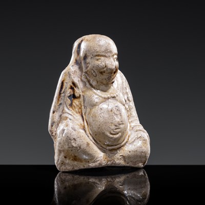 A ‘PROTECTIVE GOD’ BROWN-GLAZED POTTERY WHISTLE, JIN DYNASTY