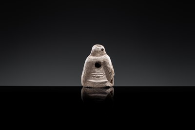 A ‘PROTECTIVE GOD’ BROWN-GLAZED POTTERY WHISTLE, JIN DYNASTY