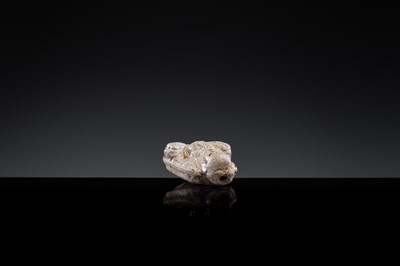 A ‘PROTECTIVE GOD’ BROWN-GLAZED POTTERY WHISTLE, JIN DYNASTY