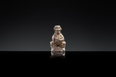 A 'DAOIST OFFICIAL' BROWN-GLAZED POTTERY WHISTLE, JIN DYNASTY