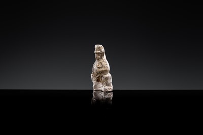 A 'DAOIST OFFICIAL' BROWN-GLAZED POTTERY WHISTLE, JIN DYNASTY